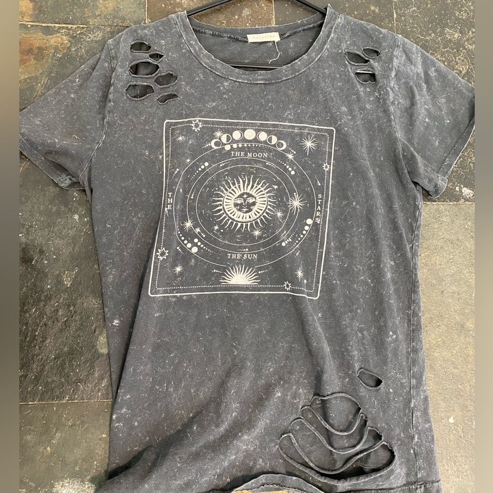 distressed grey shirt with design on front